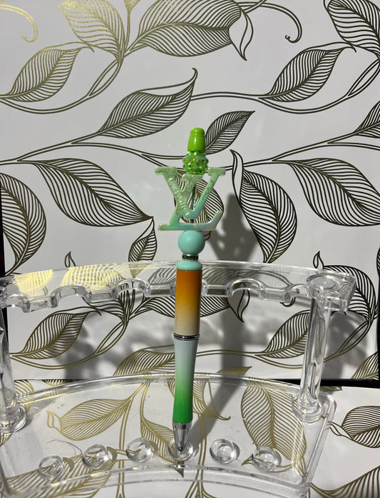 Green LV beaded pen.
