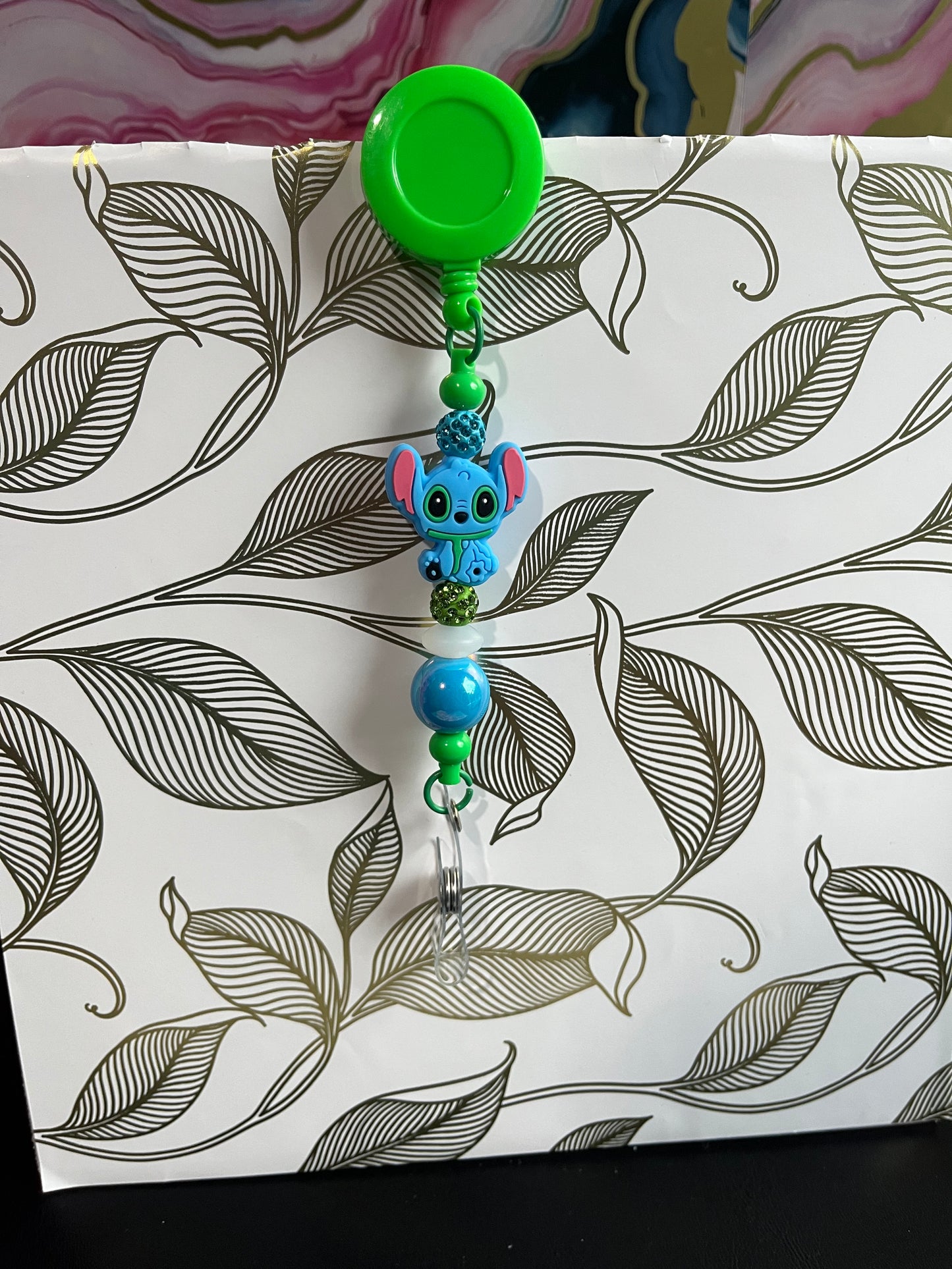 Stitch it up- retractable badge reel.